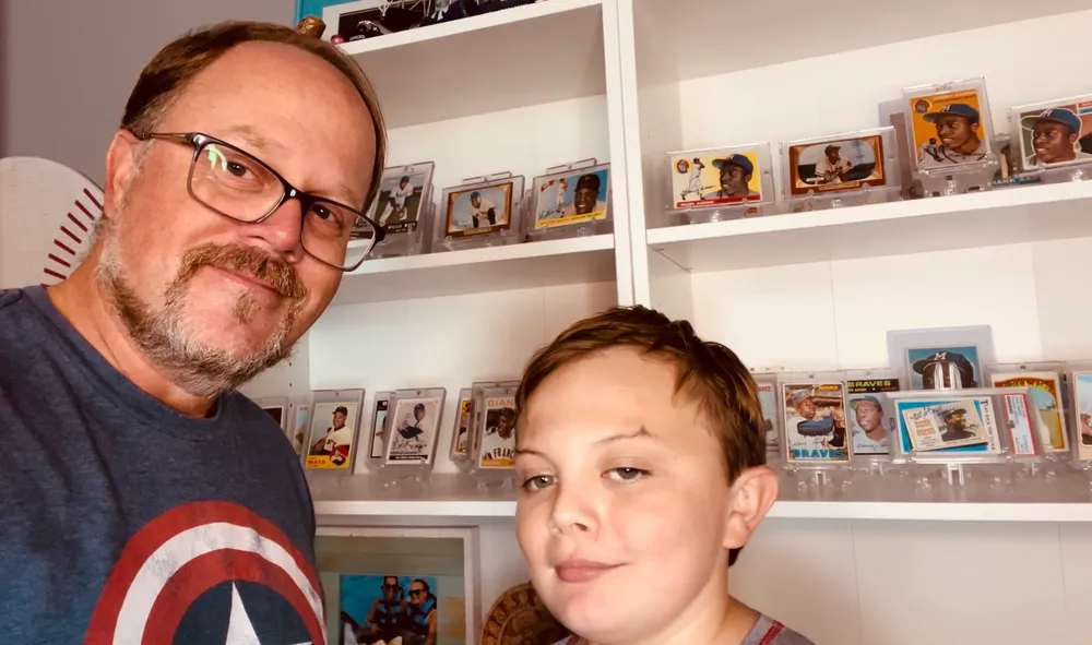Dan with his son and part of the collection
