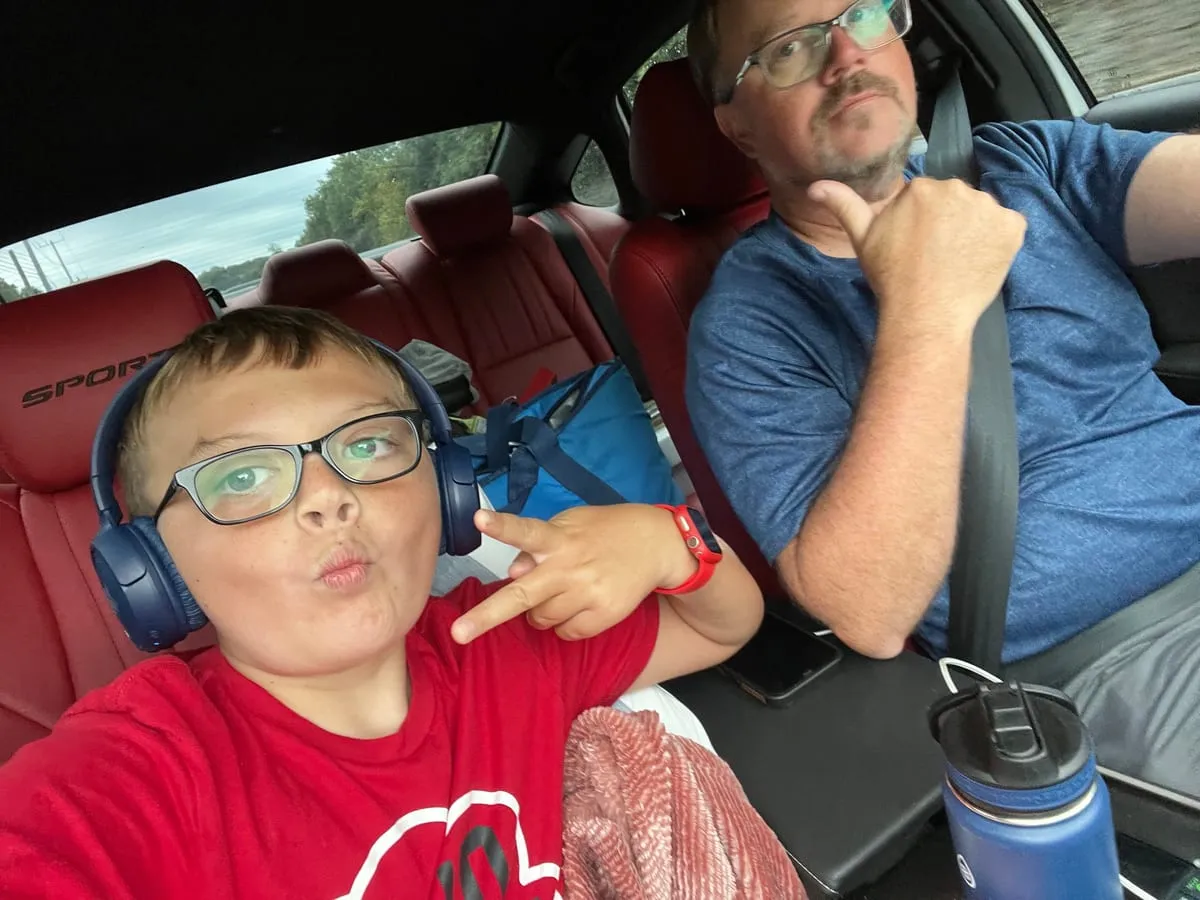 Dan and his son in the car, heading to a baseball card show